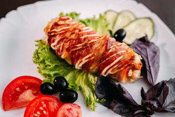 European international fusion cuisine, a beautiful dish on a white plate decorated with herbs and...