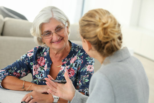 female realtor with retired woman