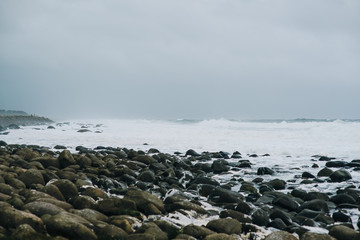Rocks in stream with smooth flowing water