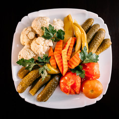 European international fusion cuisine, a beautiful dish on a white plate decorated with herbs and...