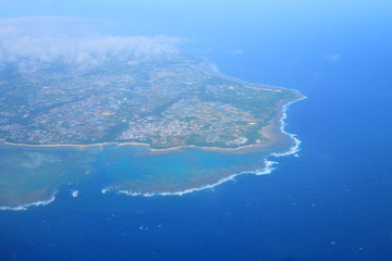 Beautiful blue sky and white cloud and landscape view from the plane in Japan Okinawa