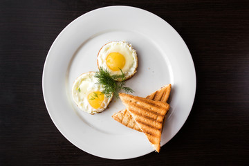 European international fusion cuisine, a beautiful dish on a white plate decorated with herbs and...