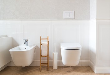 White ceramic toilet and bidet - obrazy, fototapety, plakaty