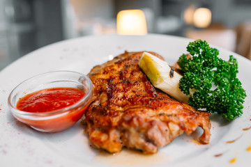 European international fusion cuisine, a beautiful dish on a white plate decorated with herbs and...