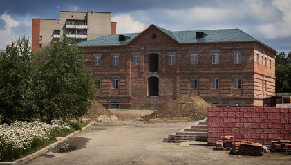 Fototapeta na wymiar Building under construction. Classical architectural style. Modern building