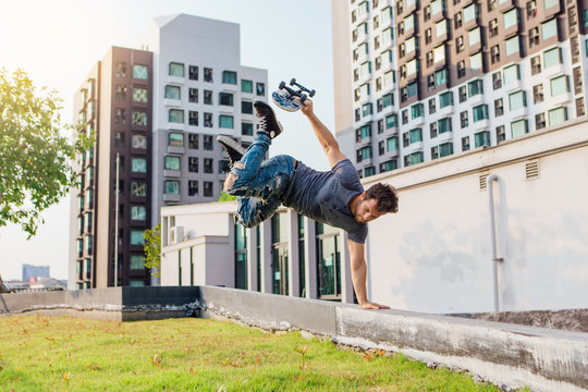 Skateboarder Handstand On Ramp