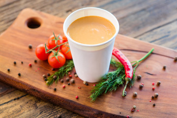 European international fusion cuisine, a beautiful dish on a white plate decorated with herbs and vegetables. a professional chef has prepared a delicious meal.