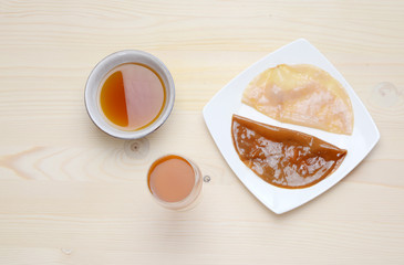 Fresh home made Kombucha fermented tea on a wooden background