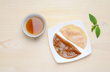 Fresh home made Kombucha fermented tea on a wooden background