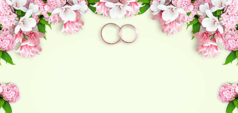 Magnolia with hydrangea flowers and bridal rings for wedding with place for your text