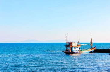 Fishing boat on the sea, Fishing boat on the sea with blue sky and white clouds.Thailand.