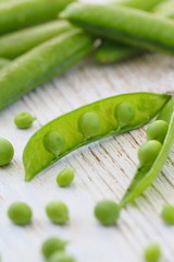 Fresh green peas on the table