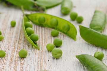 Fresh green peas on the table