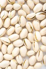 Pistachio nuts arranges as background