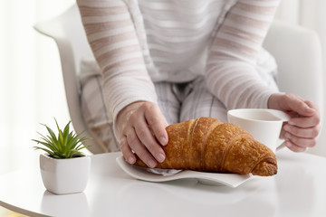 Woman having breakfast