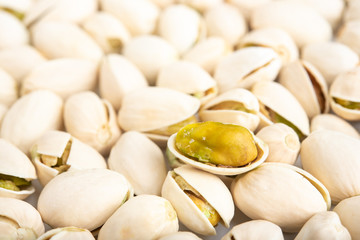 Pistachio nuts arranges as background