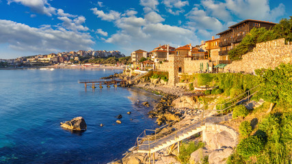 Coastal landscape banner, panorama - embankment with fortress wall in the city of Sozopol on the...