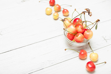 Fototapeta na wymiar Rainier cherry background, dessert food. Copy space for text.