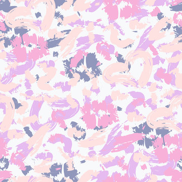 Spotted seamless pattern. vector background with abstract pink strokes. © Irina