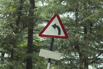 turn sign in the forest