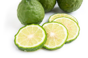 fresh bergamot fruit with leaf on white background