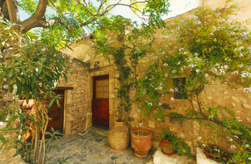 Fototapeta premium A cozy patio in Monemvasia, Greece