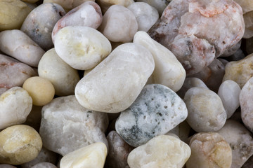 Pebbles and Quartz Stone Pile Close Up