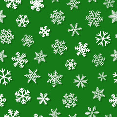 Christmas seamless pattern of snowflakes with shadows, white on green background