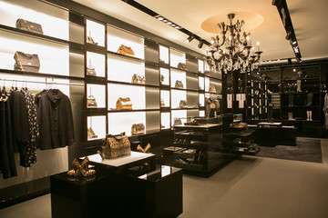 bright and fashionable interior of shoe store in modern mall