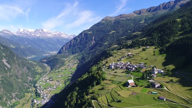 Aerial view of Val Poschiavo, village of Viano and Brusio. Grison Canton in the Swiss Alps.