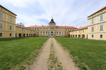 Fototapeta na wymiar Grassy court of the large Horovice castle