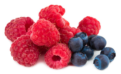 raspberry and blueberries isolated on white background
