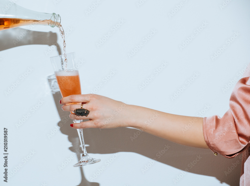 Wall mural Woman Holding Wine Glass