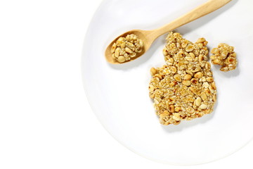 Krayasart, Thai sweet dessert made of rice on vintage white background, Cereal, food texture, Made of rice, nut, sesame-seeds sugar cook sticky paste, Eaten during the ending of Buddhist lent festival