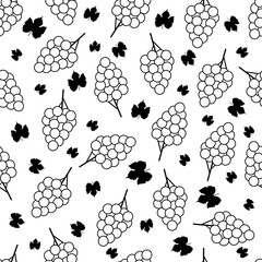 Seamless pattern with black and white grapes on the white background.