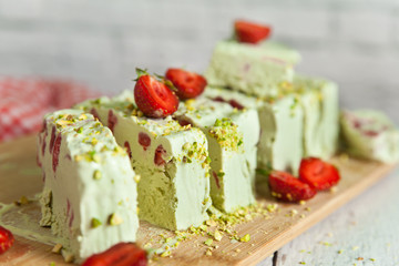 Pistachio ice cream with strawberries