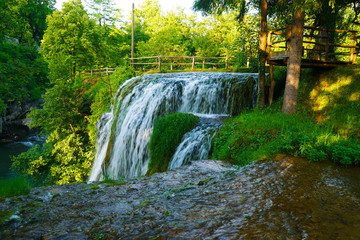 Fototapeta na wymiar Waterfall at Rastoke in Croatia in a sunny summer evening