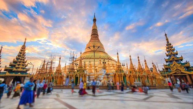 4K Timelapse of sunrise at Shwedagon pagoda in Yangon. Landmark of Myanmar