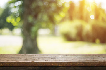 Old wood coordination table top on nature background,Space available for the product