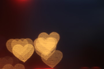 Yellow gold heart-shaped on black background Colorful lighting bokeh white for decoration at night backdrop wallpaper blurred valentine, Love Pictures background, Lighting heart shaped soft night