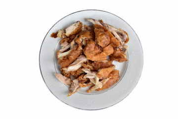 The fried chicken were choped in the white dish, isolated on white background