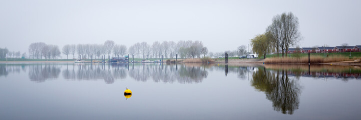 Dutch river landscape. View from the Island of Maurik in Gelderland, Netehralds