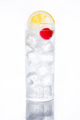 Classic Tom Collins cocktail on white background

