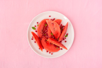 Watermelon and Pomegranate Salad on Pink Background