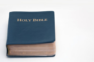 Holy Bible on White Surface