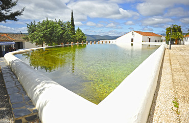 La Laguna, gran alberca de Cañaveral de León, pueblo del Parque Natural Sierra de Aracena en la...