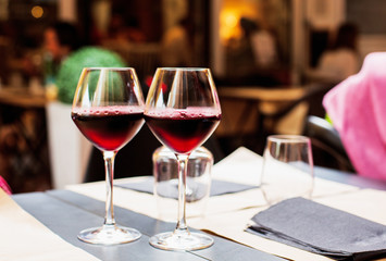 Glasses of Red Wine on The Table of a  Street Cafe