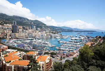 Fototapeta na wymiar .Monte-Carlo, Beautiful View of Luxury Yachts, Boats and Apartments in harbor of Monaco