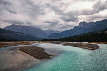 Mountain River in the Canadian Rocky Mountains, British Columbia, Canada in later afternoon light.