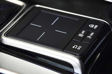 Trackpad black clos-up, Touchpad for controlling the media system in the car